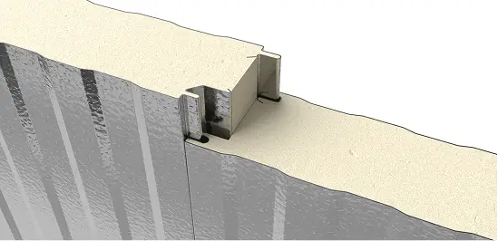 Close-up of PermaCore PHF insulated metal panel with Heavy Mesa profile, stucco embossed, stainless steel finish